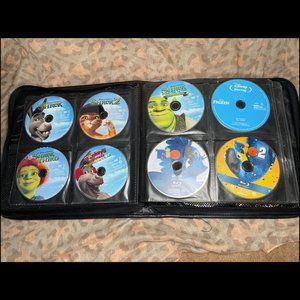 Binder of 137 Discs - Bluray and DVDs - Disney/True Blood/Shrek/Futurama/ATHF